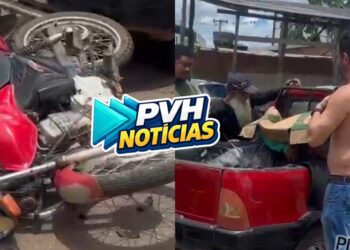NO CENTRO: Motociclista para em carroceria de Fiat Strada após batida